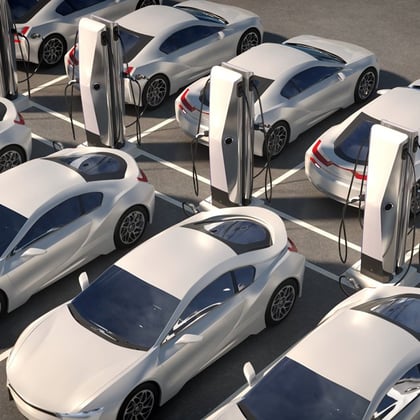 Parked electric cars at a charging station