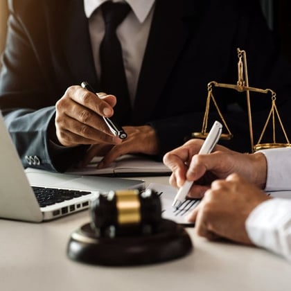 Lawyers negotiating at a table